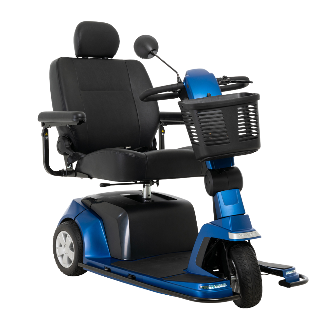A Pride Mobility Maxima 3-Wheel Bariatric Scooter in blue and black with a 500 lbs weight capacity, padded seat and backrest, armrests, front basket, handlebars with rearview mirror is shown on a white background.