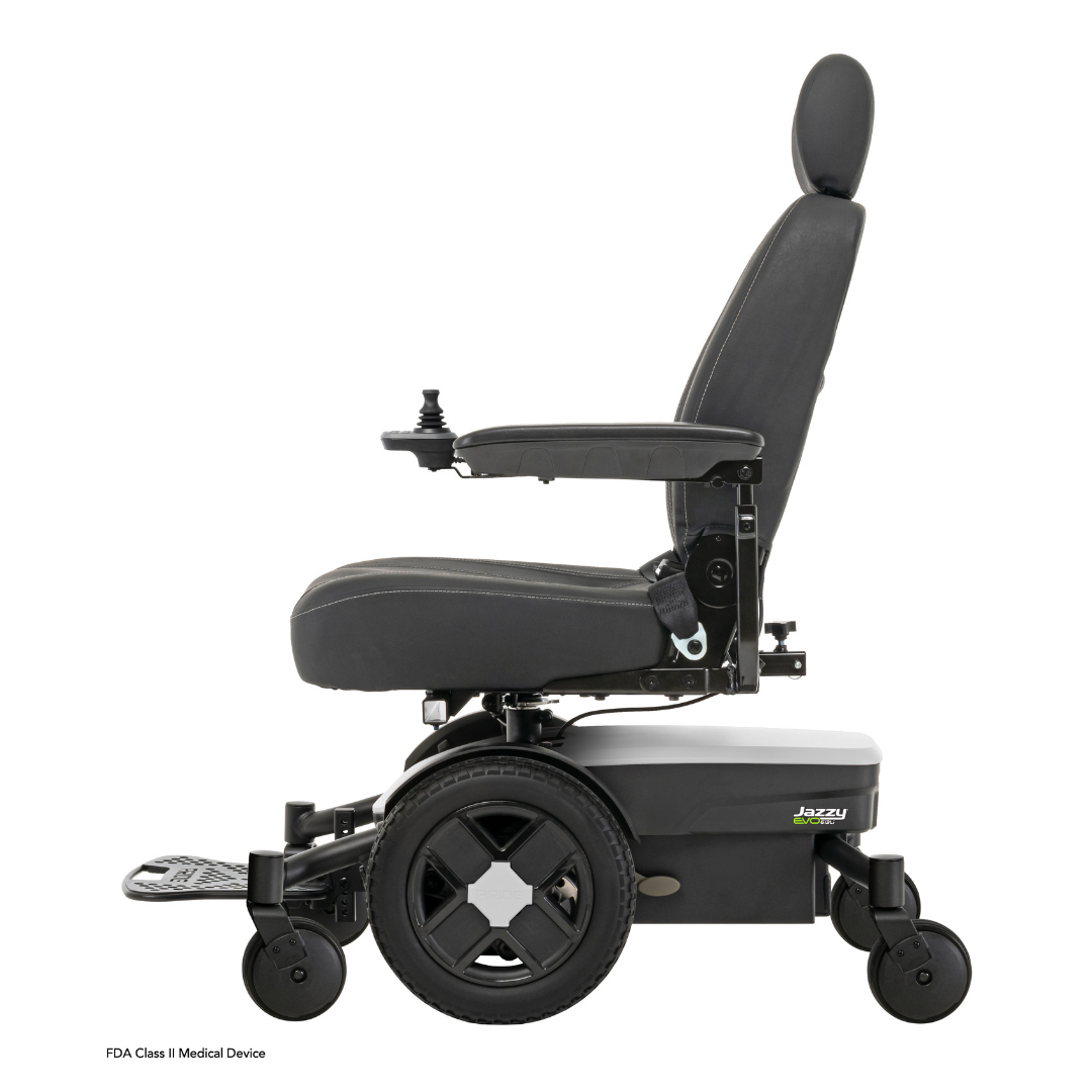 Side view of a black Pride Mobility Jazzy® EVO 613 Powerchair with ATX Suspension, featuring a high backrest, joystick armrest, footrest, large rear wheels, and Mid-Wheel 6® Technology. Jazzy branding is visible on the base.