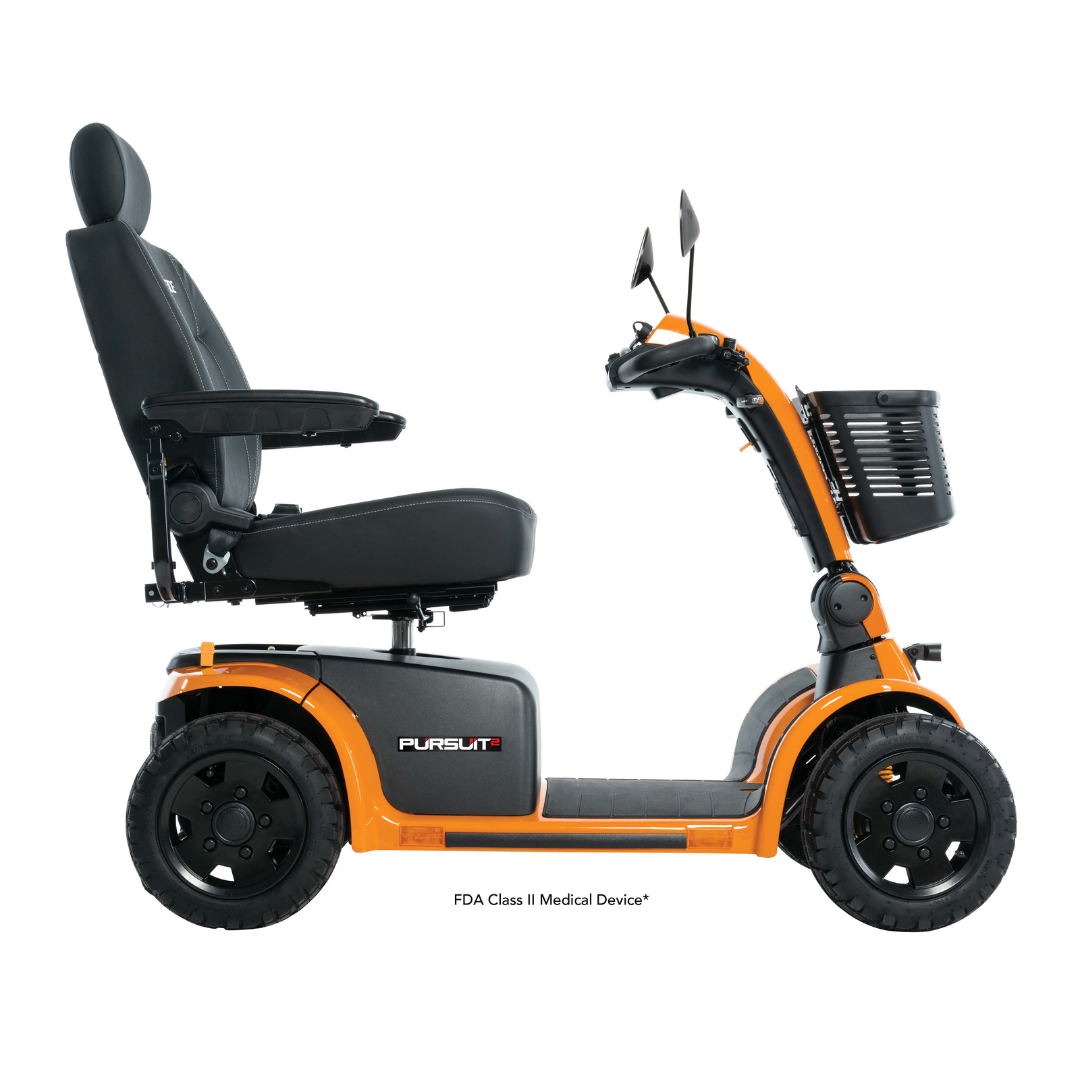 Side view of the orange Pride Mobility Pursuit® 2 Offroad HD Scooter with black cushioned seat, armrests, four large wheels, front basket, and rearview mirrors—ideal as a durable lightweight mobility solution.