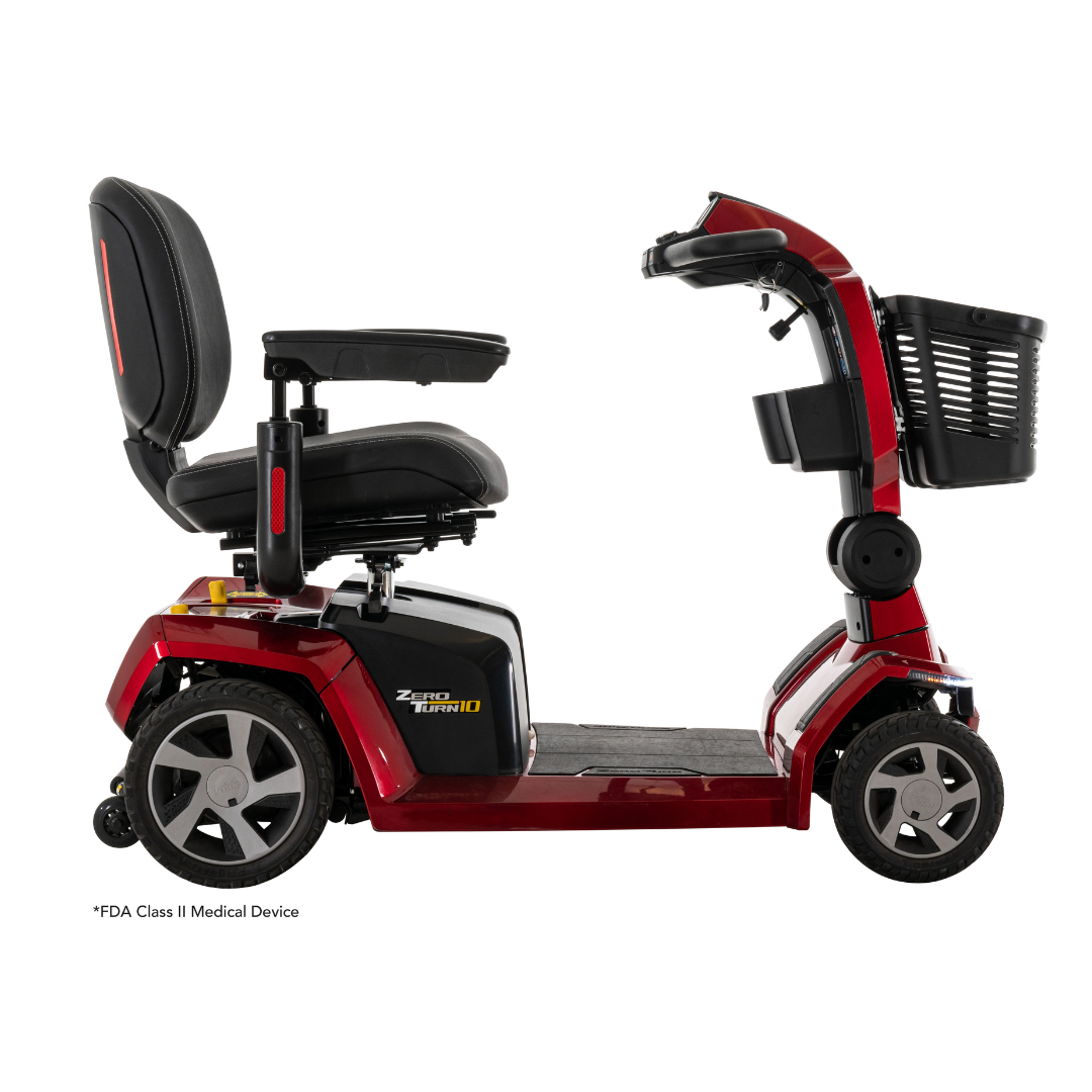 A red, four-wheeled midsize Pride Mobility Zero Turn 10 HD Scooter features a black seat, armrests, large wheels, and a front basket. The side displays its name and highlights advanced EZ Turn Technology against a white background.