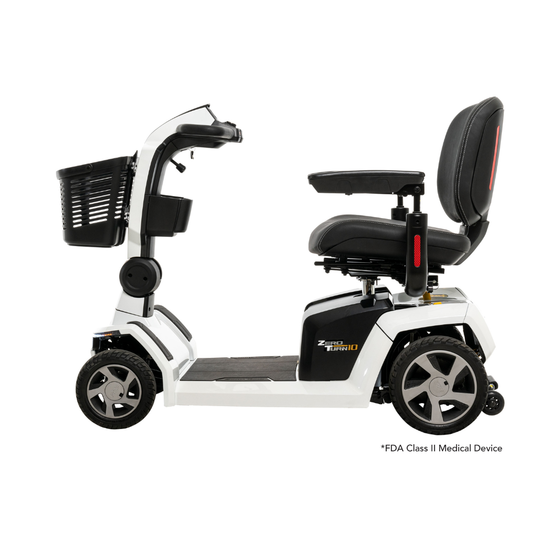 The Pride Mobility Zero Turn 10 HD Scooter is a white, midsize mobility scooter with a black seat, armrests, front basket, four wheels, and control panel. Shown from the side on a white background. Features EZ Turn Technology.