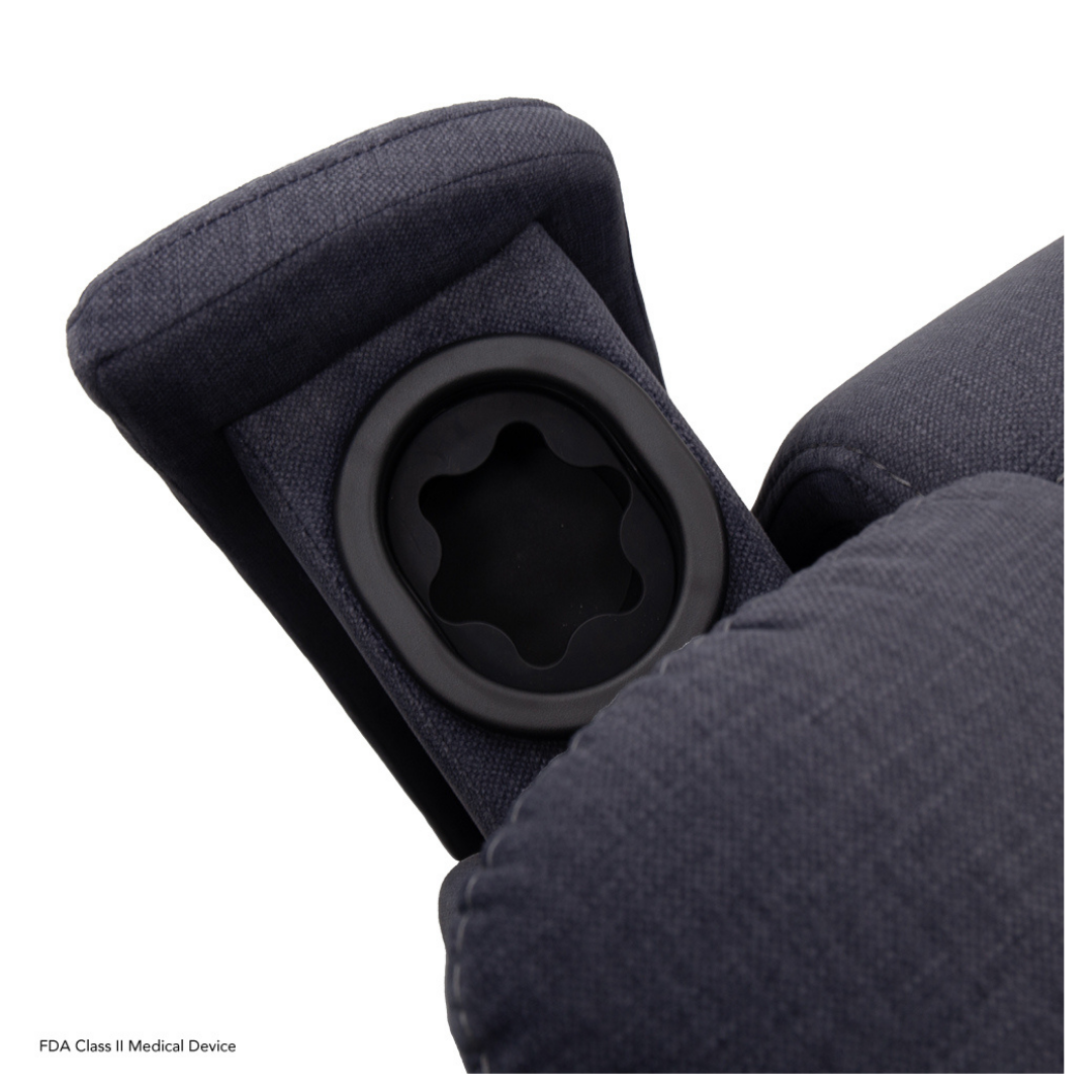 Close-up of a dark gray fabric armrest with a black circular cup holder, highlighting the cushioned, textured material featured in Pride Mobility Evolution Collection Power Lift Recliners.