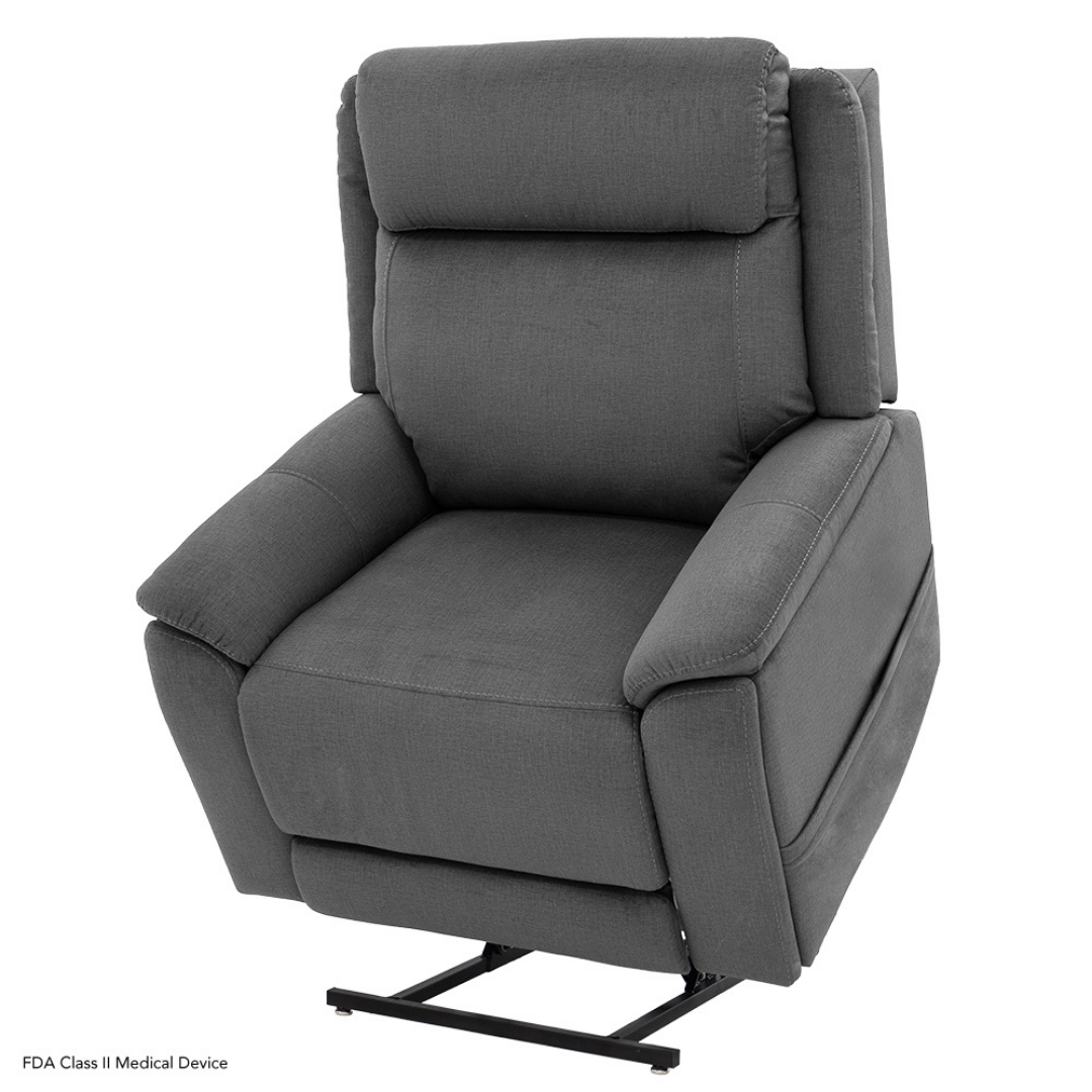 The Pride Mobility Evolution Collection Power Lift Recliner features gray upholstery, a high back, cushioned armrests, and an extended metal base for easy lifting assistance.