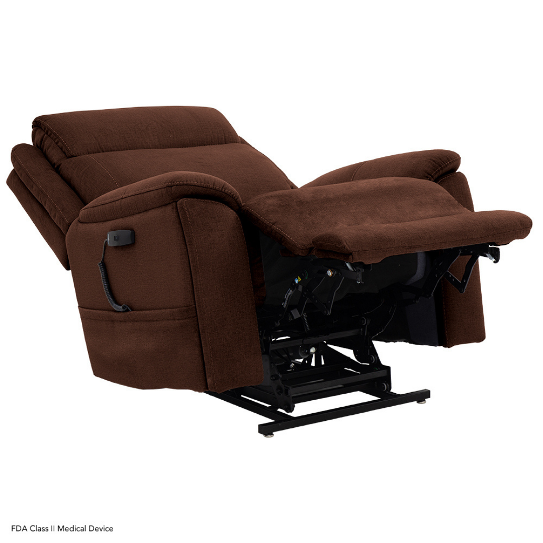 The Pride Mobility Evolution Collection Power Lift Recliner in brown fabric is shown partially reclined with the footrest extended and seat angled upward, offering premium comfort and assistance for standing up.