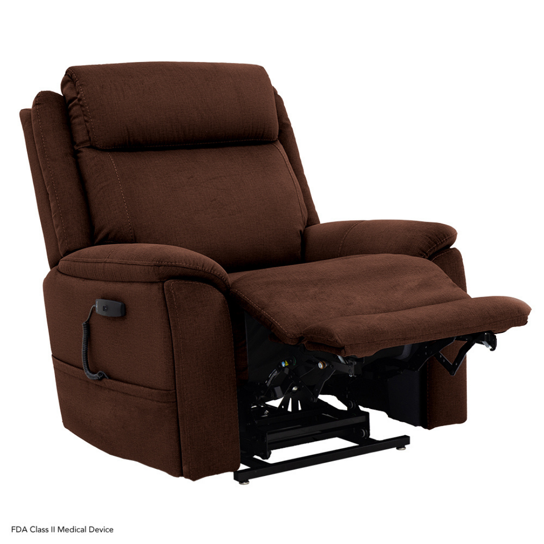 The Pride Mobility Evolution Collection Power Lift Recliner is a large, brown upholstered chair with padded armrests, a partially extended footrest, and a side control panel for premium comfort and relaxation.