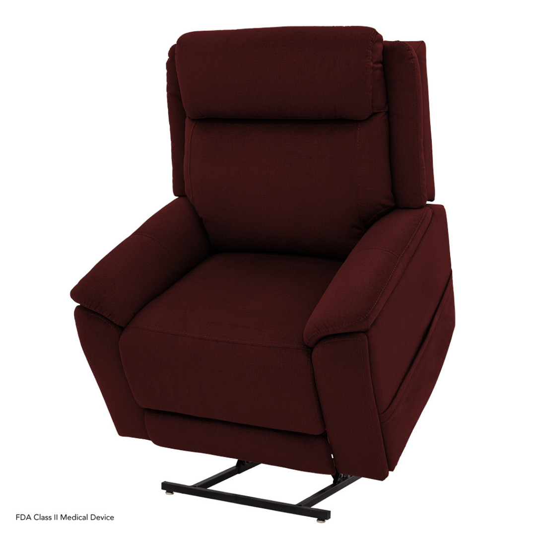 The Pride Mobility Evolution Collection Power Lift Recliners in maroon upholstery feature padded armrests and backrest, shown partially elevated, offering premium comfort and designed to assist with standing.