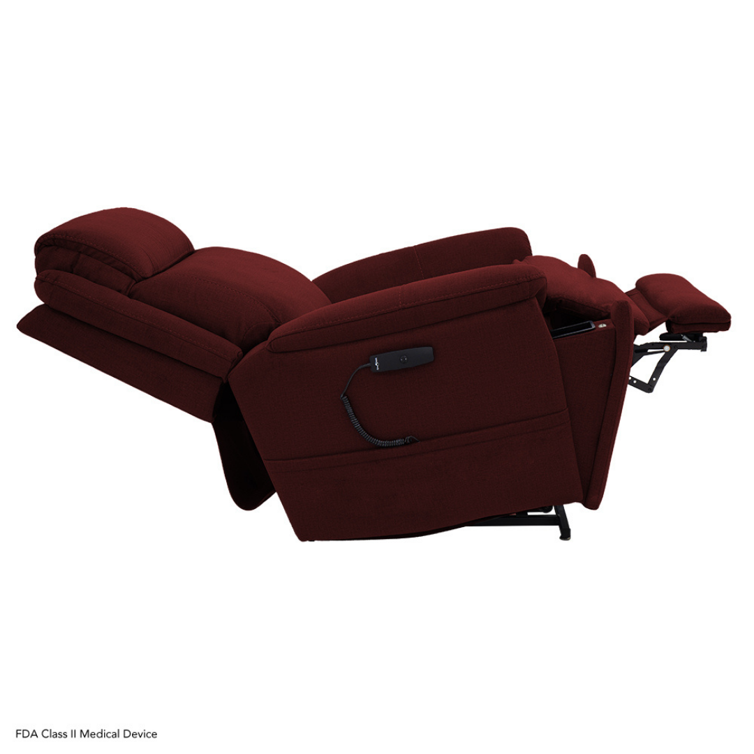 A maroon Pride Mobility Evolution Collection Power Lift Recliner is fully reclined, displaying its extended backrest and footrest, with a wired remote control attached to the side, set against a white background.