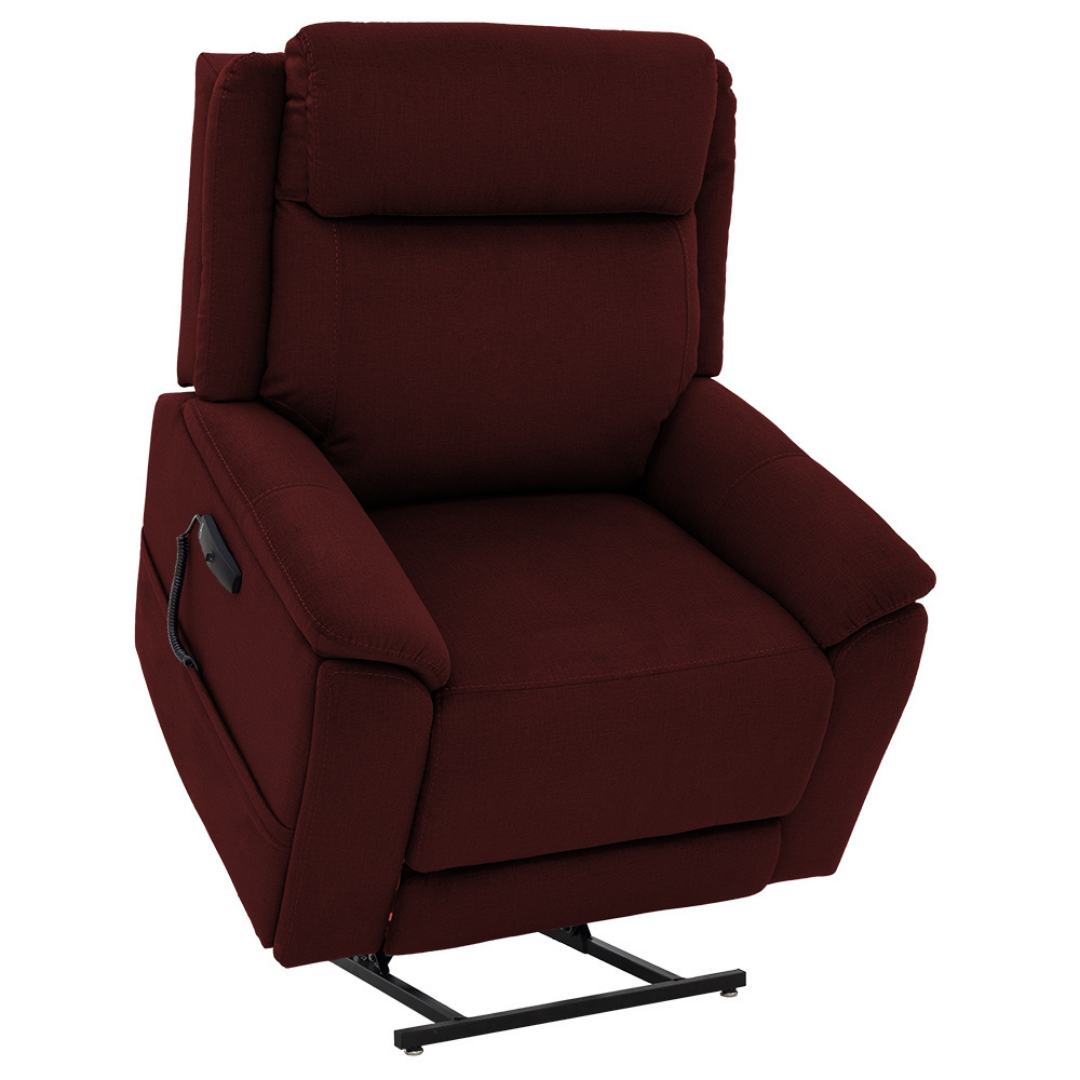 The Pride Mobility Evolution Collection Power Lift Recliner, shown slightly raised, features maroon upholstery, padded armrests, an extended footrest, plush fabric, and a side pocket.