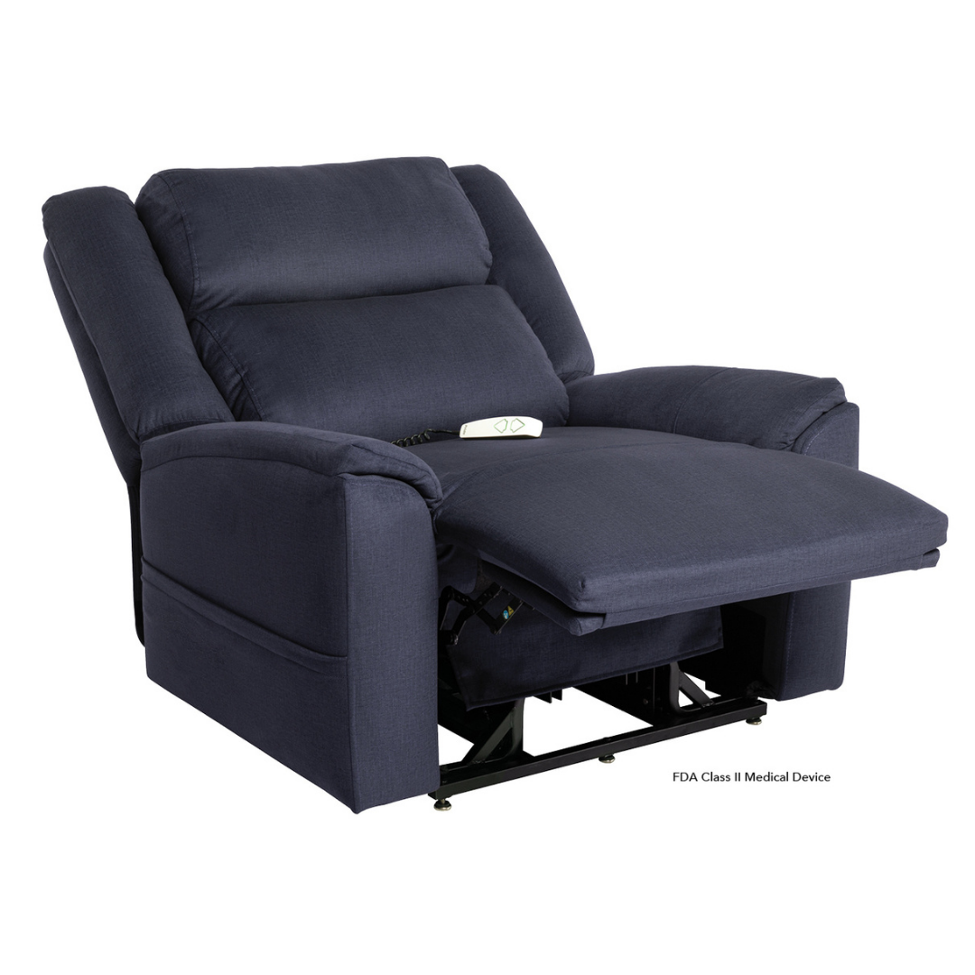 The Pride Mobility Evolution Collection Power Lift Recliner, shown in dark blue upholstery with an extended footrest and remote on the seat, features plush fabrics for exceptional comfort—ideal for relaxation.
