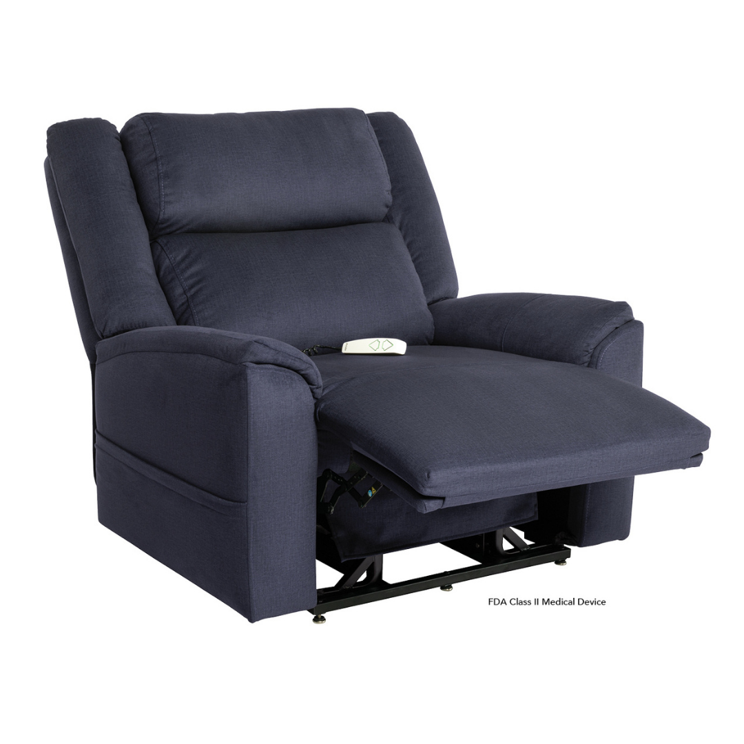 The Pride Mobility Evolution Collection Power Lift Recliner features dark blue plush cushions, a partially extended footrest, and a remote control on the seat, all shown against a crisp white background.