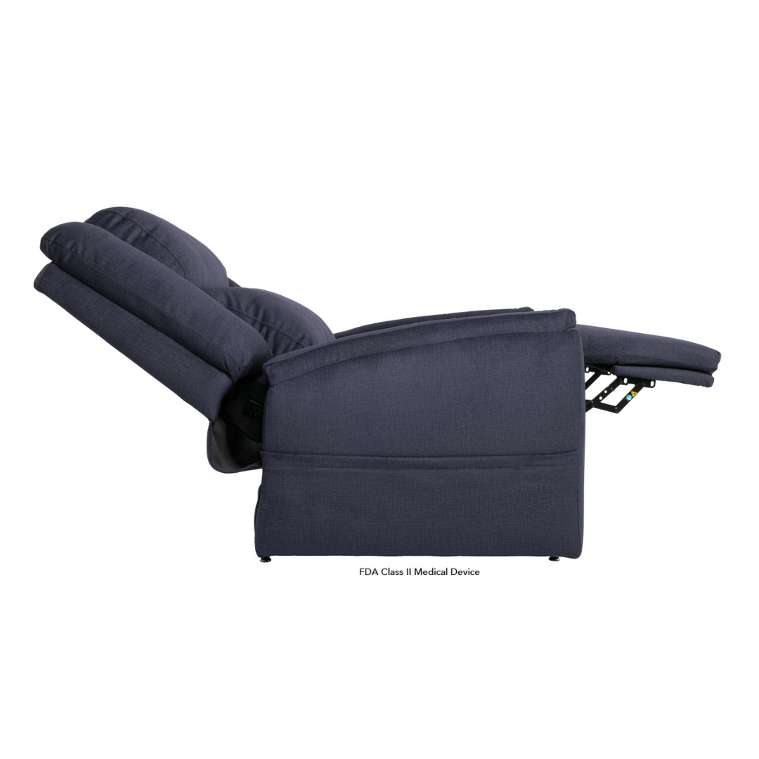 A Pride Mobility Evolution Collection Power Lift Recliner in dark blue, fully reclined with footrest extended and back tilted, is shown from the side on a white background. Plush fabric offers the comfort typical of premium recliners.