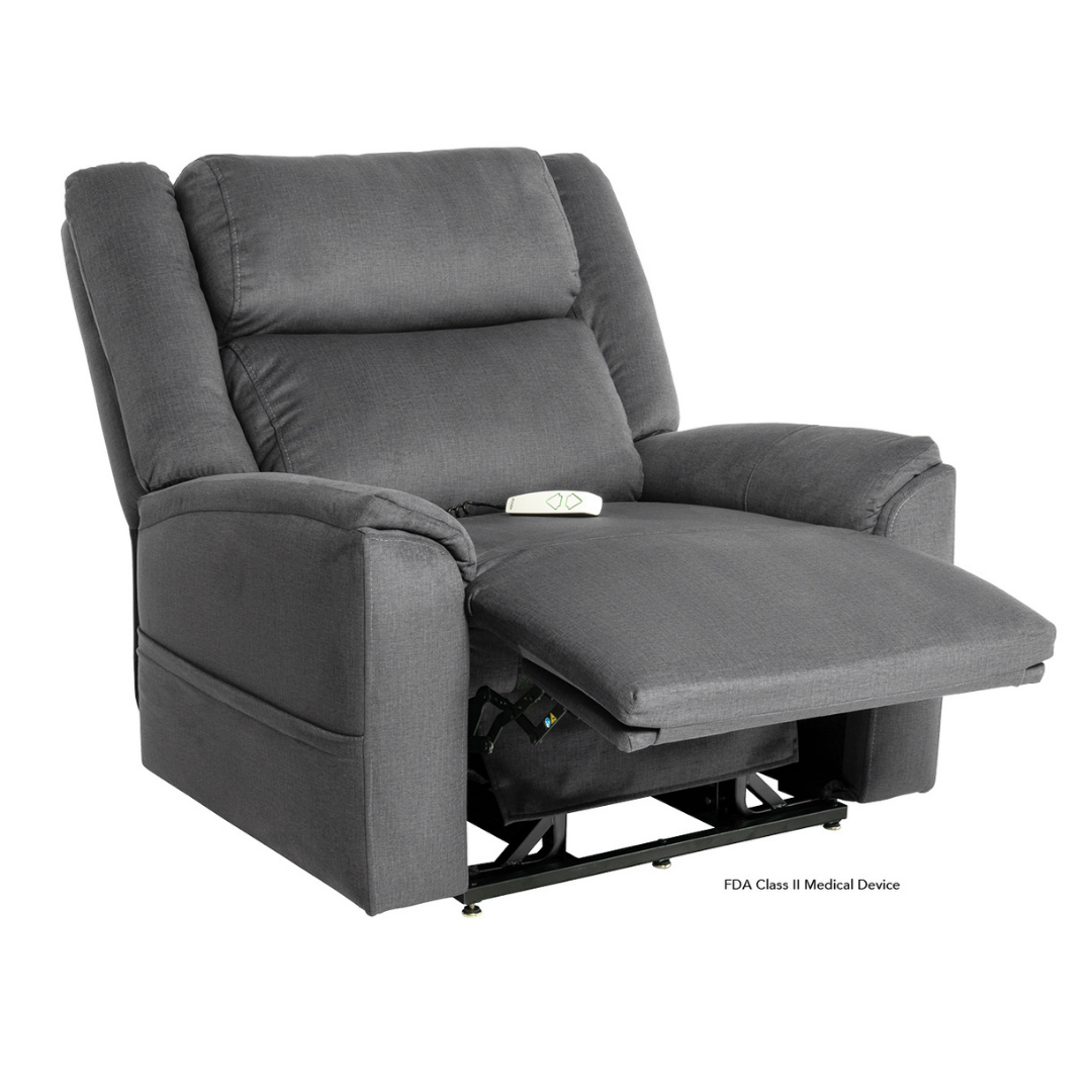 A plush gray Pride Mobility Evolution Collection Power Lift Recliner with extended footrest and attached remote, shown on a white background. This recliner offers premium comfort for relaxation or medical needs.