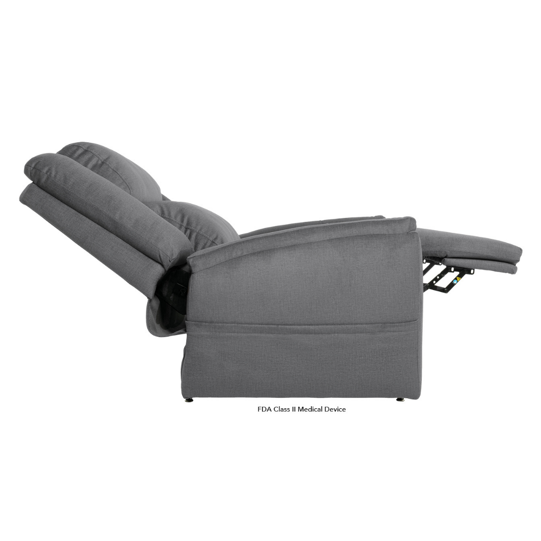 Side view of a gray Pride Mobility Evolution Collection Power Lift Recliner fully extended, featuring a padded backrest, footrest, armrests, visible control panel near the seat, and an FDA Class II Medical Device label.