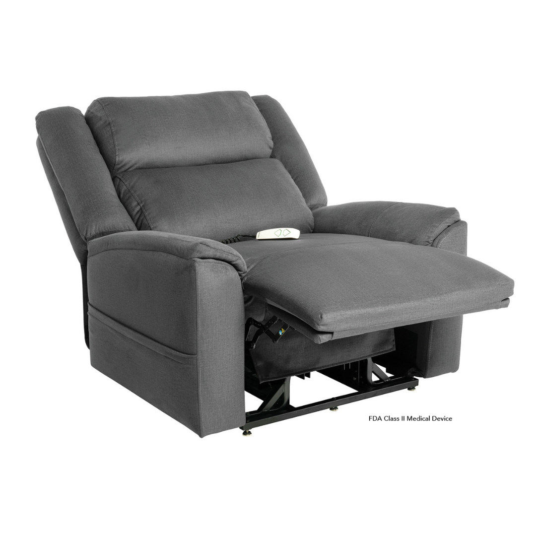 The Pride Mobility Evolution Collection Power Lift Recliners feature plush gray upholstery, padded back and arms, extendable footrest, and remote control. Shown reclined. Labeled as an FDA Class II Medical Device with premium features.