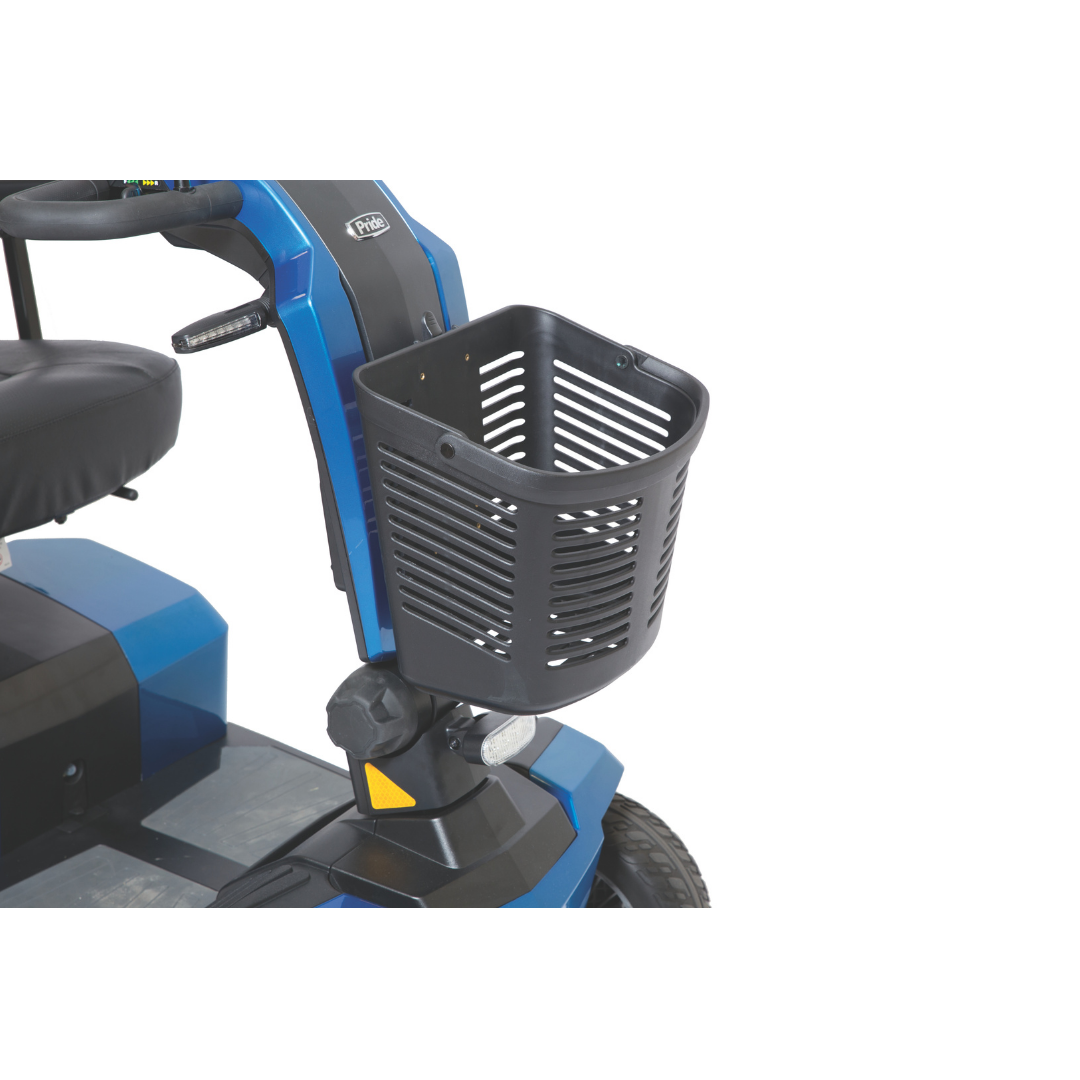 Close-up of the Pride Mobility Scooter Front Basket in black, attached to a blue scooter. Visible are the seat, steering column, and front wheel area. Ideal storage solution for Pride Mobility scooters.