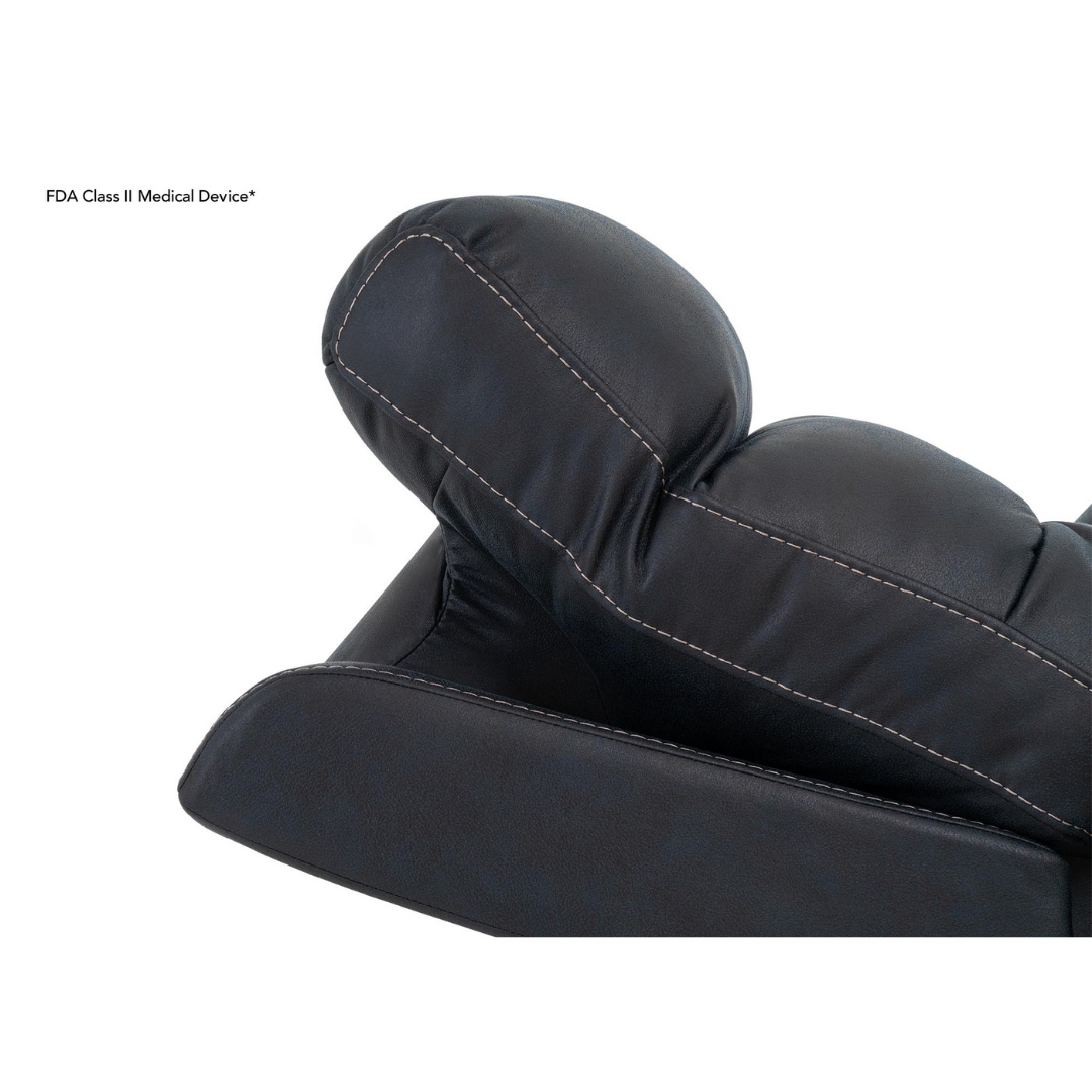Close-up of the headrest and upper backrest on the Pride Mobility VivaLift! Radiance Recliner with Lift Assist & Heat, featuring black leather and visible stitching. FDA Class II Medical Device appears in the top left corner.