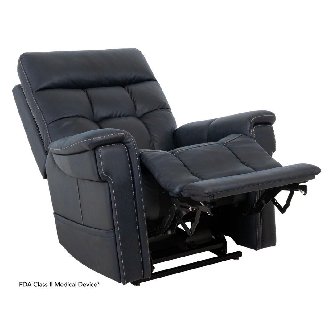 The Pride Mobility VivaLift! Radiance Recliner with Lift Assist & Heat, shown in black leather with padded armrests and extended footrest, offers infinite positioning for personalized comfort. FDA Class II Medical Device* text appears in the bottom left corner.