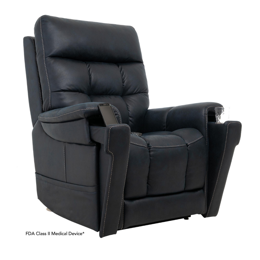 The Pride Mobility VivaLift! Radiance Recliner with Lift Assist & Heat is a black leather chair with padded seat and armrests, infinite positioning, and a remote control on the left armrest, shown against a plain white background.