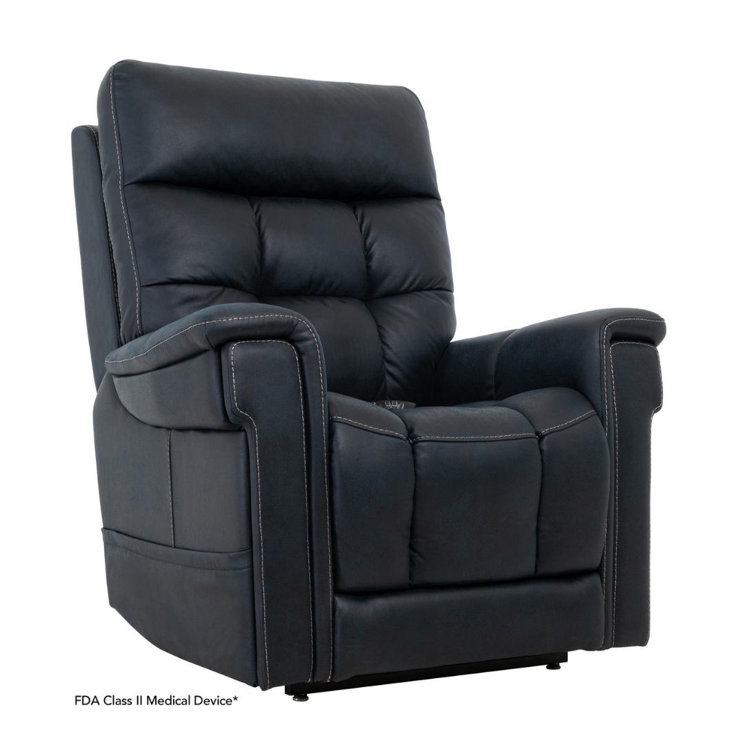 The Pride Mobility VivaLift! Radiance Recliner with Lift Assist & Heat is a dark leather power chair featuring padded armrests, tufted backrest, visible white stitching, and infinite positioning for comfort, shown against a plain white background.