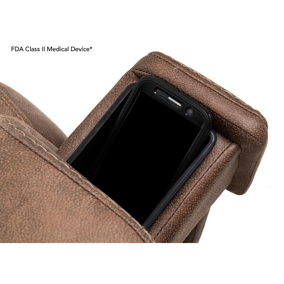 A smartphone rests in a brown leather VivaLift! Radiance Recliner with Lift Assist & Heat armrest pocket. Text reads, FDA Class II Medical Device*.