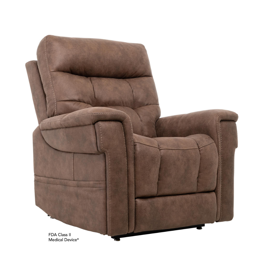 The Pride Mobility VivaLift! Radiance Recliner with Lift Assist & Heat is a brown, cushioned power chair with soft upholstery and padded armrests, infinite positioning, and is an FDA Class II medical device shown angled on a white background.