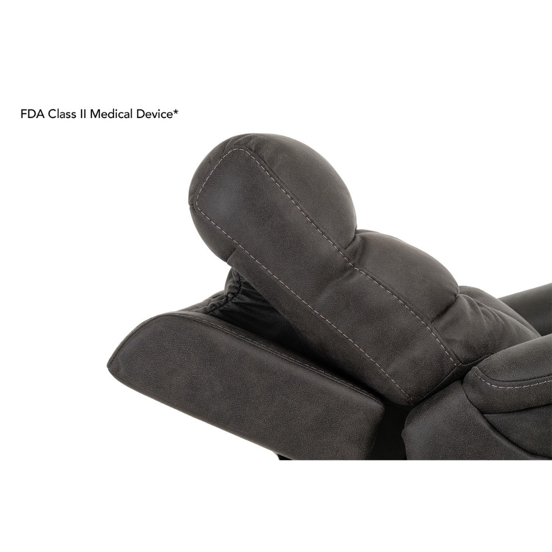 Close-up of the Pride Mobility VivaLift! Radiance Recliner with Lift Assist & Heat in dark gray, showing its cushioned headrest and backrest with detailed stitching. FDA Class II Medical Device* notes infinite positioning for personalized comfort.