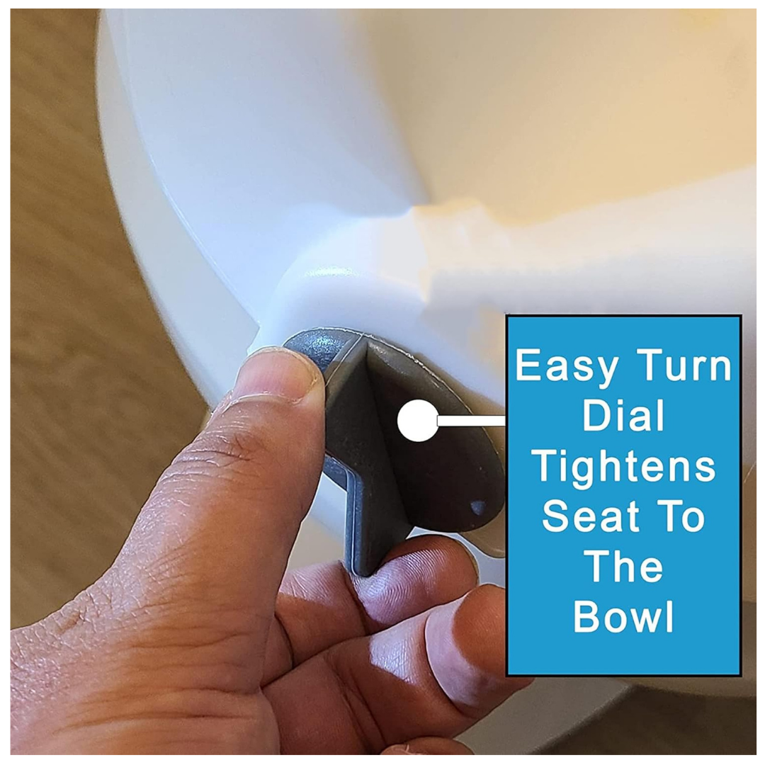 A hand turns a gray dial on the ProBasics E-Z Lock 4.5 Raised Toilet Seat with Handles. A label points to the dial, reading: Easy Turn Dial Tightens Seat To The Bowl.