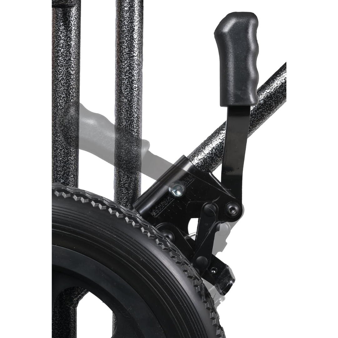 Close-up of a textured black metal lever mechanism beside the 12-inch rear wheels of the ProBasics Folding Bariatric Transport Chair with Desk Arms, showing the lever in two positions to illustrate its movement or adjustment.