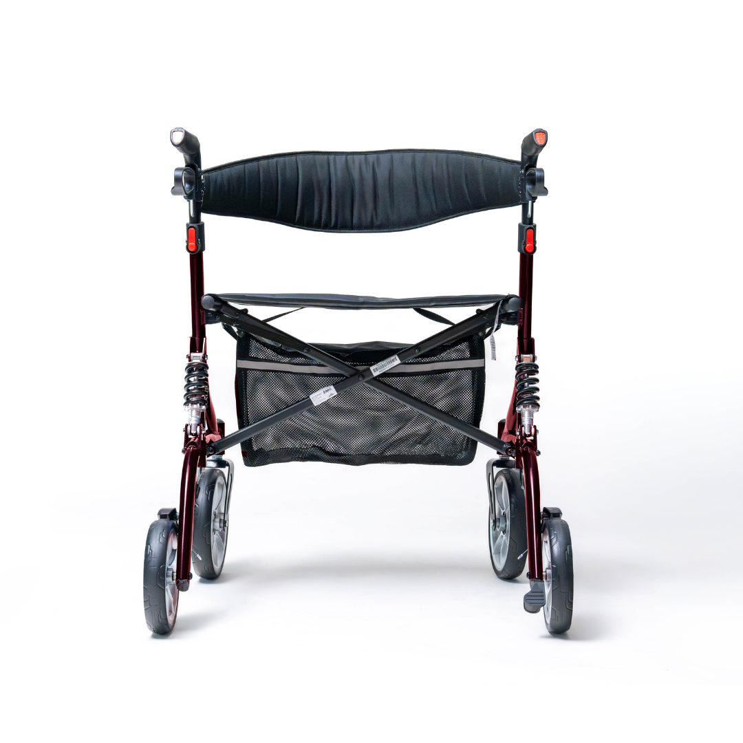 The Probasics Ascent XR™ Euro-Style Bariatric Rollator with Suspension is a lightweight, heavy-duty walker featuring ergonomic handlebars, a black seat, and storage pouch, shown front-facing on a white background.