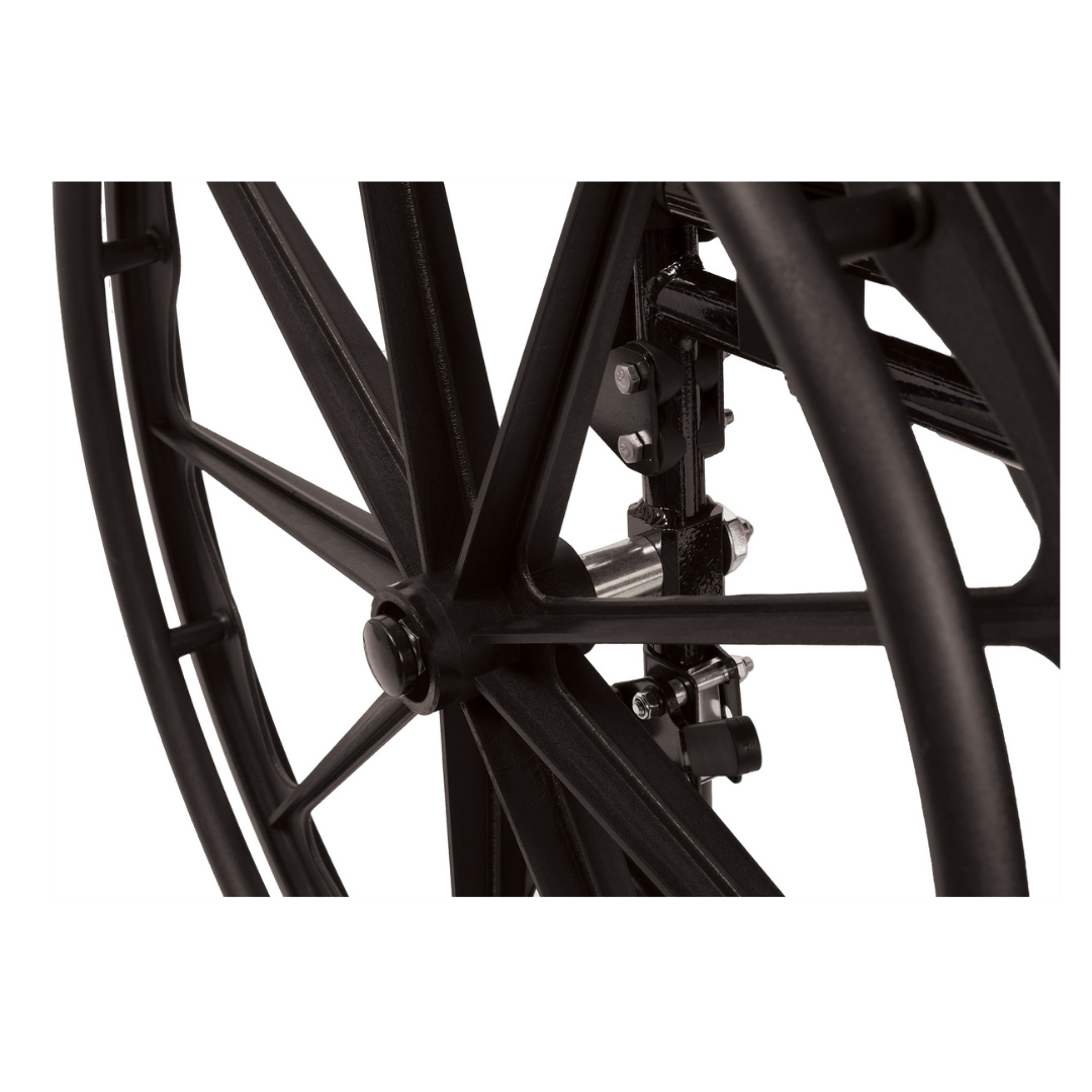 Close-up view of a black metal wheel with spokes on the ProBasics K4 Transformer Hybrid Transport Wheelchair, highlighting its mechanical components and attachment points.