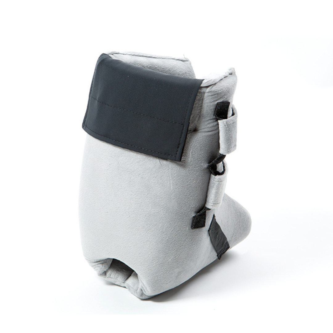 The Proactive Protekt® Heel Gel Elevation Boot with Hot or Cold Gel Pack is a soft, light gray orthopedic boot with black straps and flap, designed for medical support or to help prevent pressure sores during recovery. Shown on a white background.