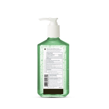 A green clear plastic pump bottle of PURELL® Advanced Gel Sanitizer, 12 oz, is shown from the back, displaying its black and white drug facts and ingredients label.