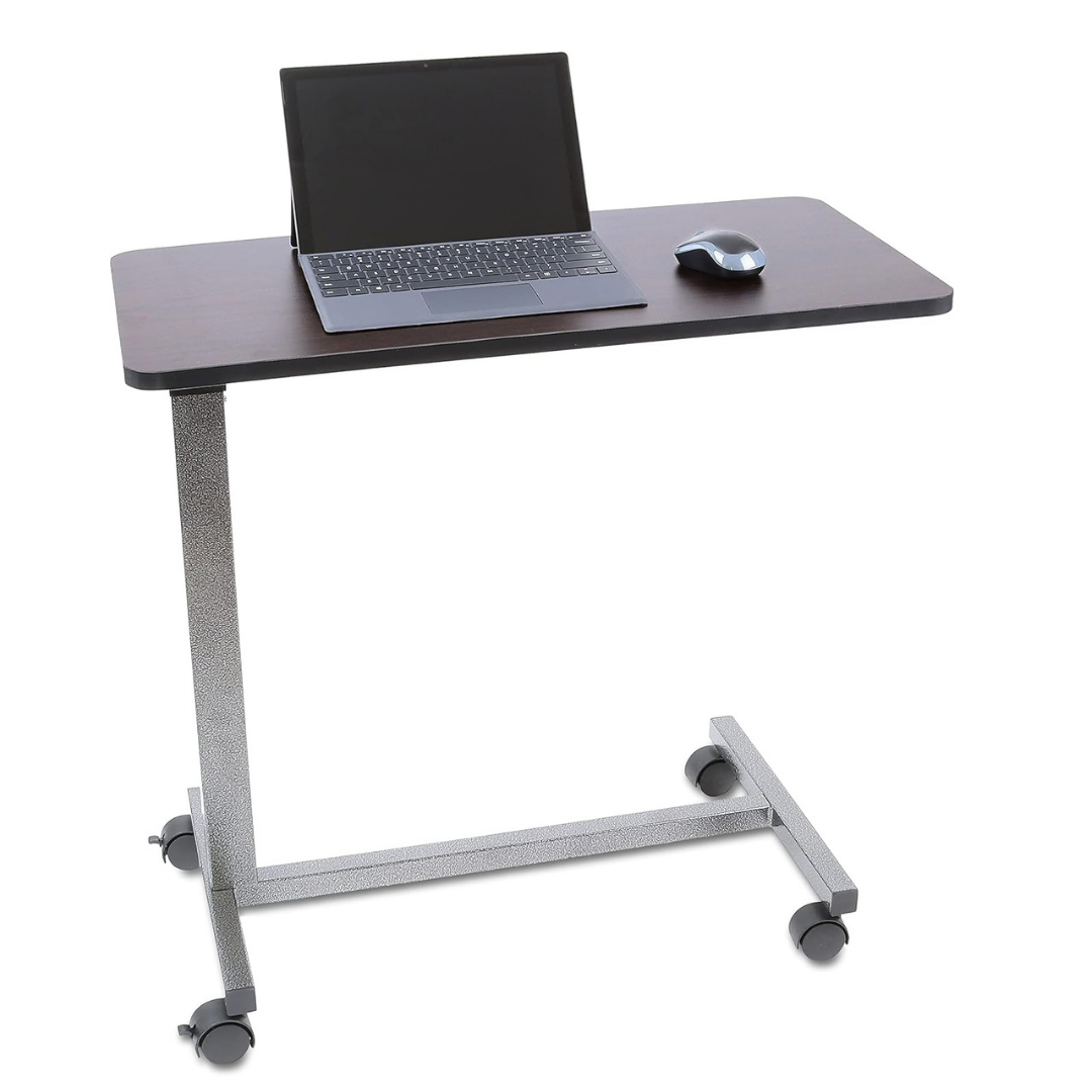 The Roscoe Rolling Overbed Table is a non-tilting bedside table with a dark wooden top and metal legs on wheels, ideal for holding your laptop and mouse as an adjustable workspace or overbed table in any flexible environment.