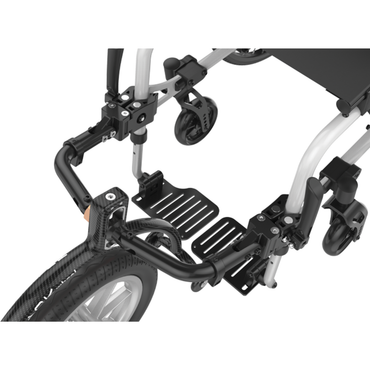 Close-up view of the front part of a wheelchair with footrests, frame, and small front wheels. The metal and carbon fiber frame is designed for the Rehasense Double Arm Track Wheel - XL 12" Carbon Outdoor Wheel, ideal for outdoor freedom.