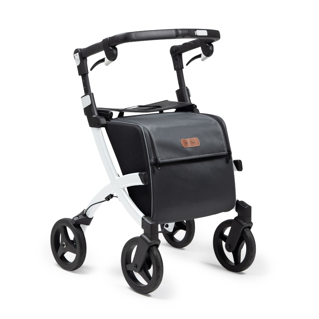 The Rollz FLEX 2 is a black and white rollator walker with four wheels, featuring a sturdy metal frame, compact design, XL storage bag, seat, handlebar, and small leather accent.