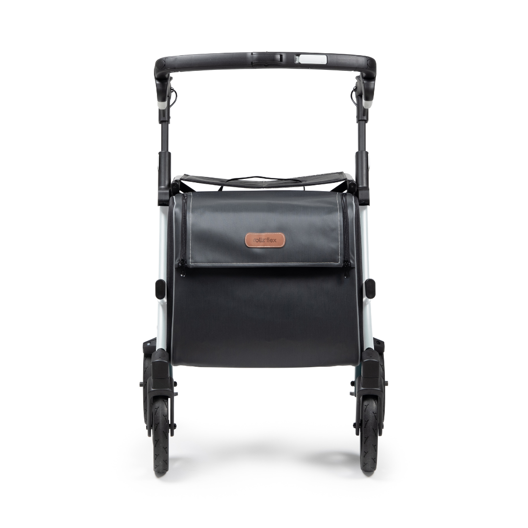The Rollz FLEX 2 Lightweight Rollator Walker is front-viewed, highlighting its compact design with four wheels and a handlebar. It offers a sleek look with a spacious XL storage bag discreetly tucked beneath the seat.