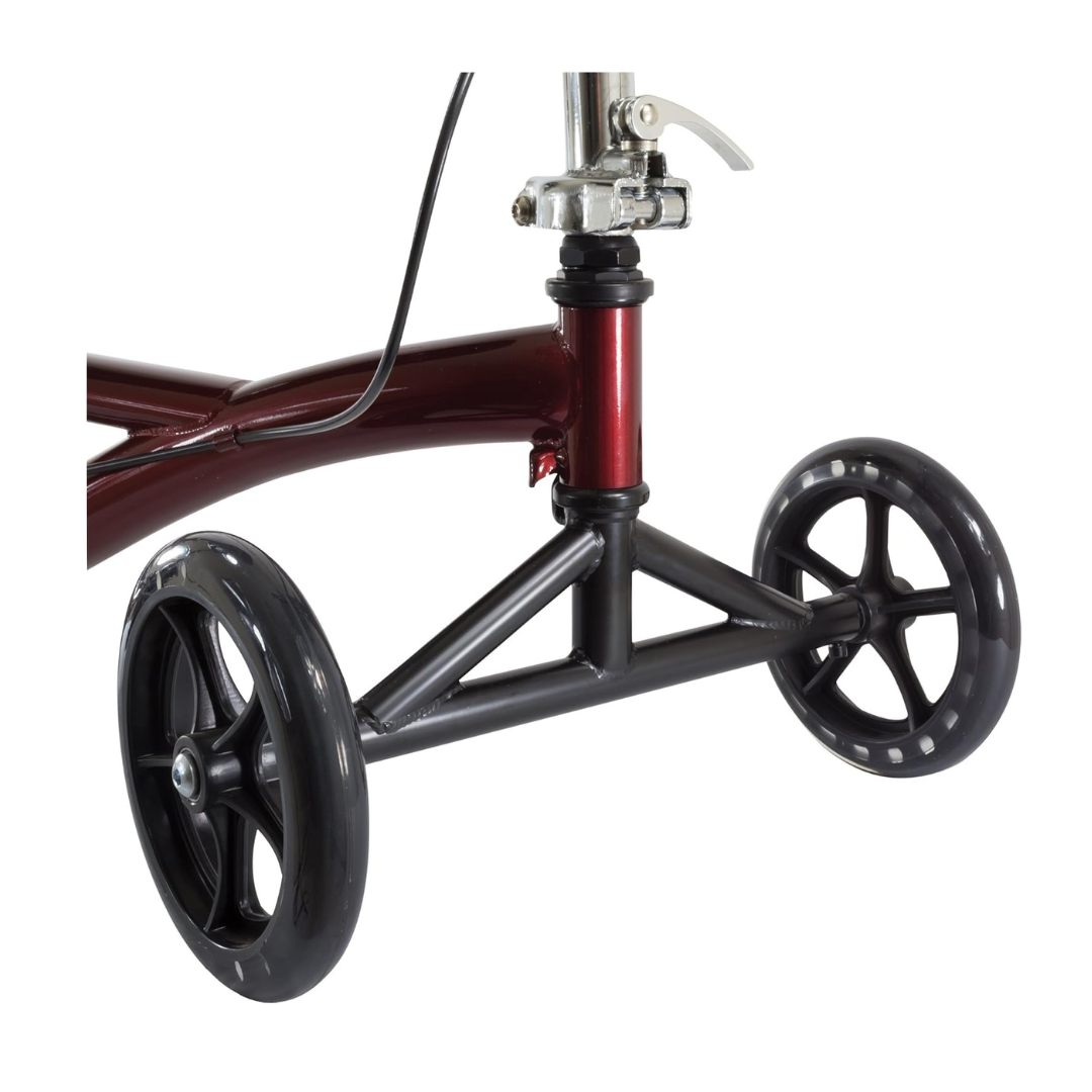 Close-up of the Roscoe Portable Lightweight Rolling Knee Walker’s front section, featuring two black wheels on a black and red frame with a visible brake lever—a practical, portable mobility aid for enhanced support.