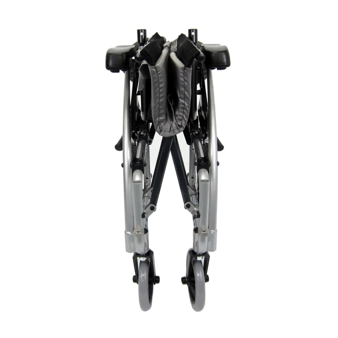 A front view of the folded Karman S-Ergo 115 Ergonomic Ultralite Transport Wheelchair showcases its silver frame and grey seat. Its sleek, compact design ensures easy storage or transport, while small front wheels enhance convenience and mobility.