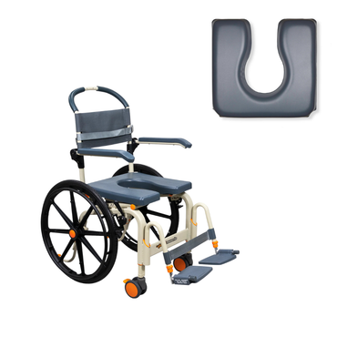The ShowerBuddy SB6W Roll-In Shower Wheelchair is a gray and white self-propelled chair with footrests, a large seat opening for shower or commode use, and comes with an extra U-shaped seat cushion shown above the chair.