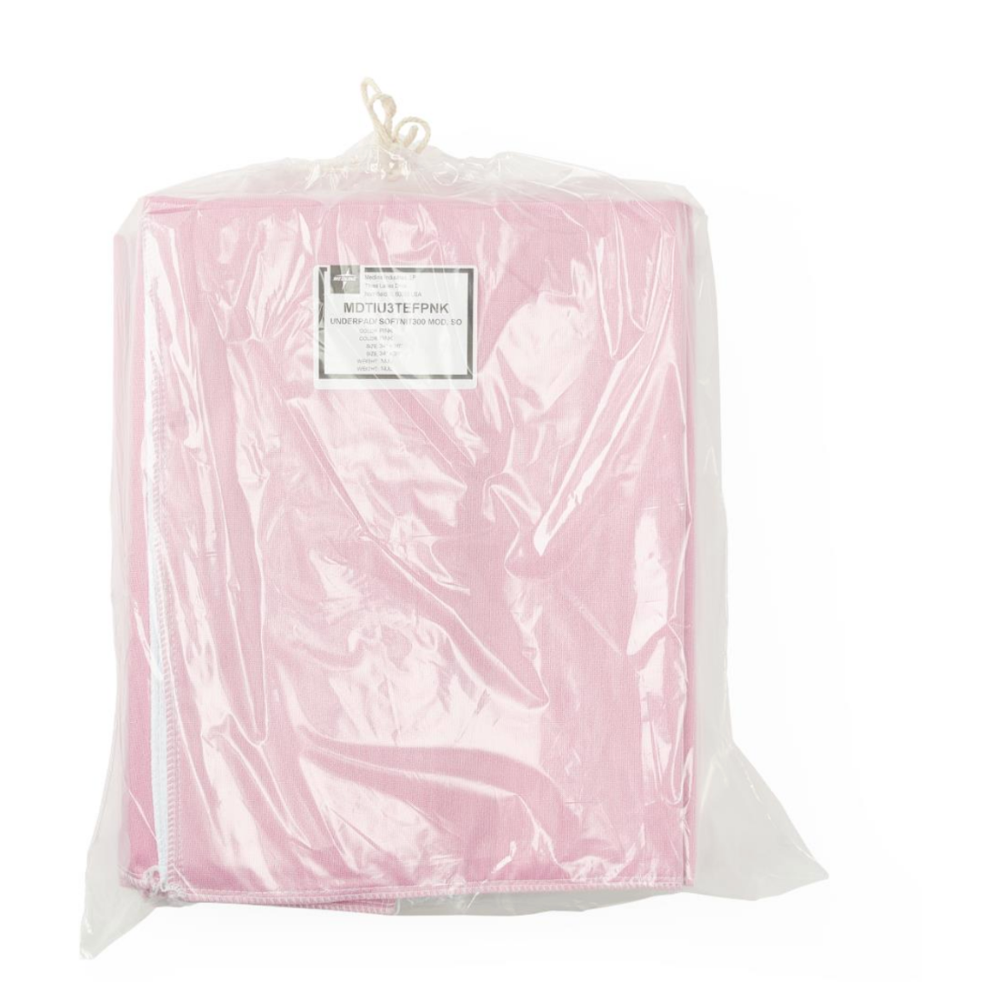 The Medline Sofnit 300 Reusable Underpads (Case of 24) come folded in a clear plastic bag with a white label and string tie; pink in color, they feature white-stitched edges for comfort and added durability.