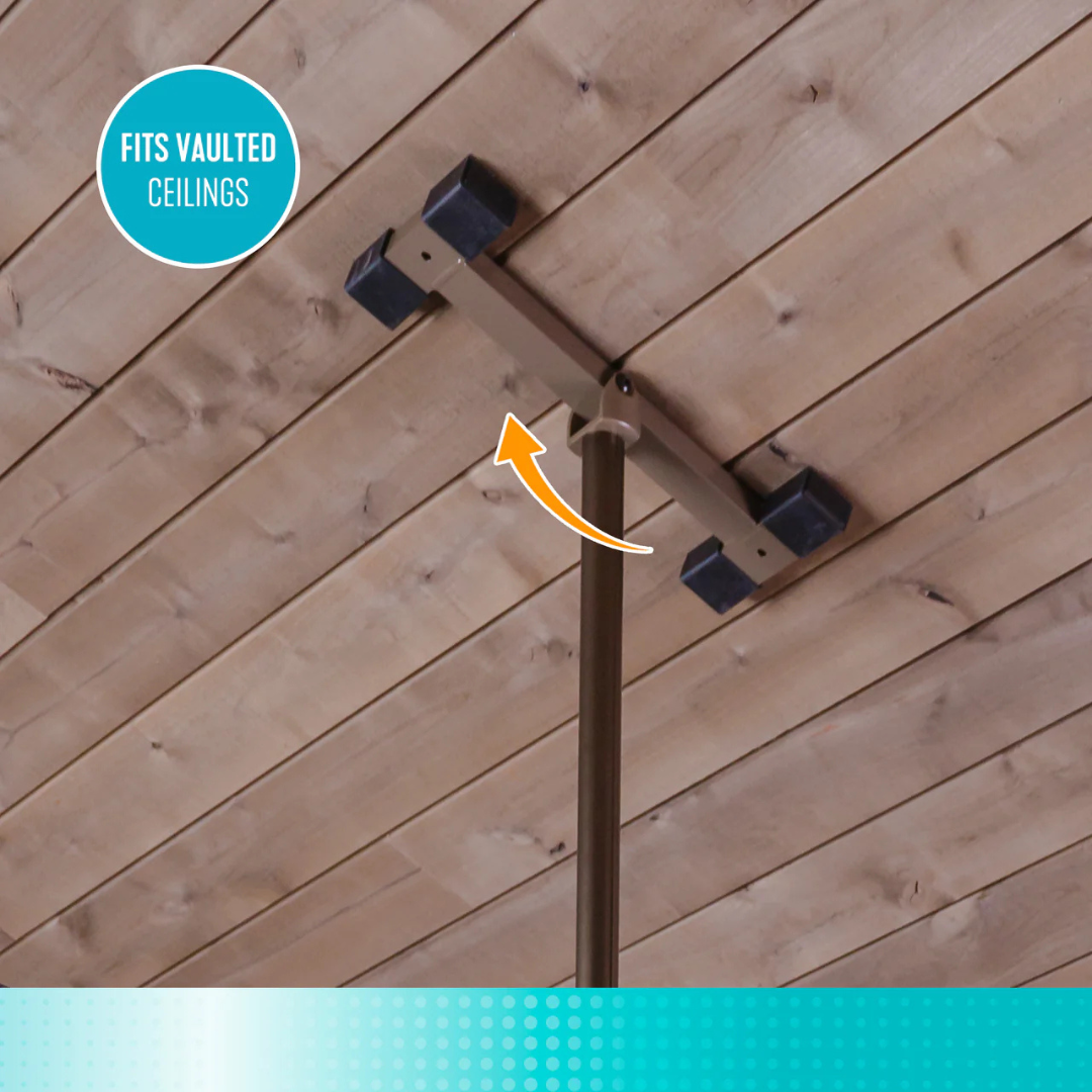 Stander Wonder Pole Premium - Fall Prevention Pole supports a tension-mounted metal rod with black end caps on a wooden vaulted ceiling. An arrow points to the bracket labeled "FITS VAULTED CEILINGS"—ideal for bathroom safety or grab bar use.