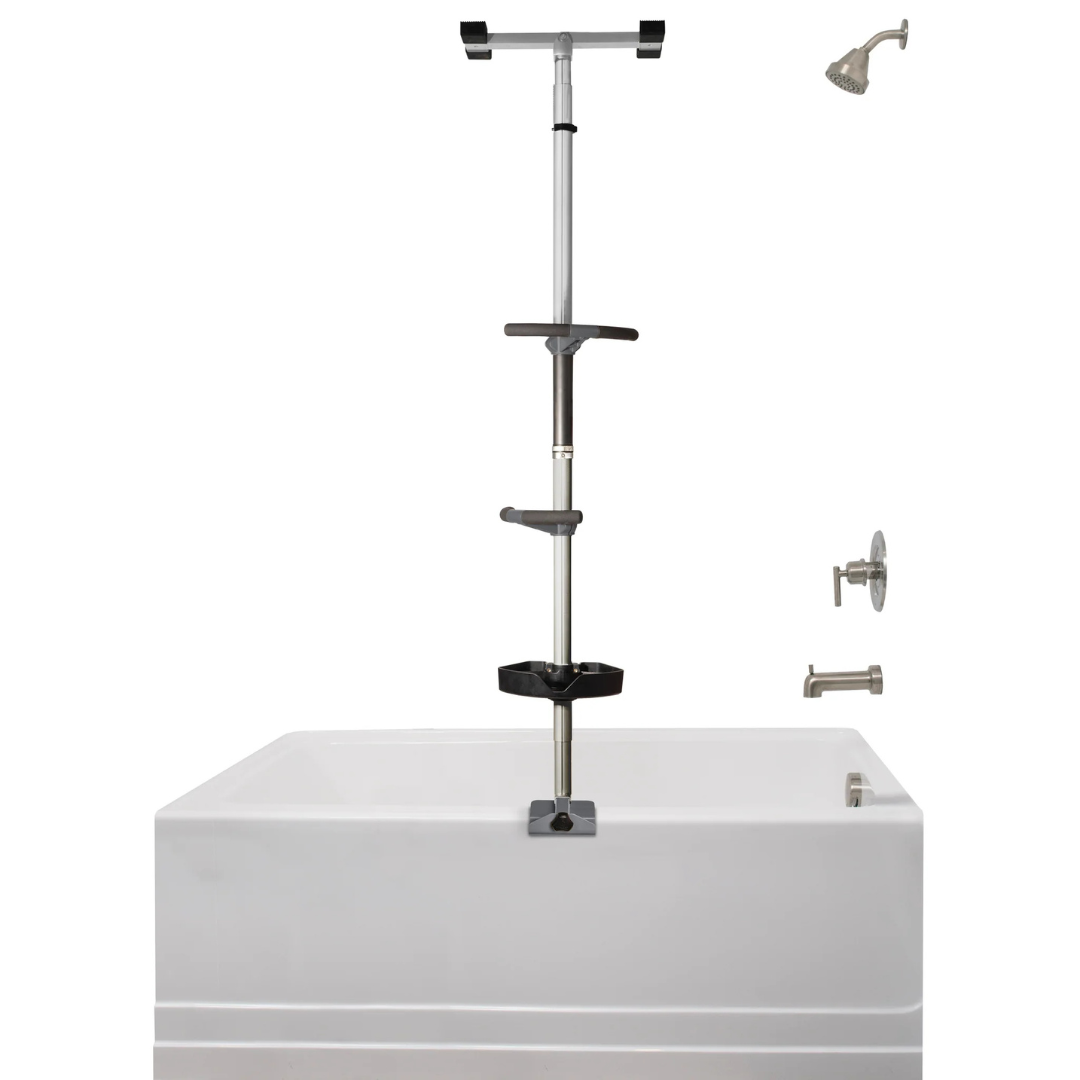 A Stander Wonder Premium Bathtub Fall Prevention Pole in silver, with shelves and handles, is installed vertically in a white bathtub next to a wall-mounted showerhead, faucet, and handles for added safety.