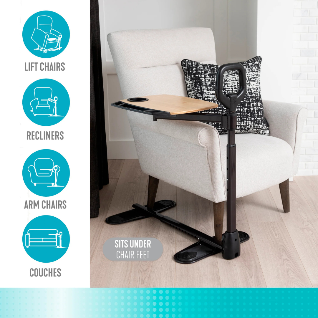 The Stander Assist-A-Tray—Standing Aid with Swivel Tray and cup holder—is shown beside a beige chair; icons highlight compatibility with lift chairs, recliners, armchairs, and couches. Text reads: SITS UNDER CHAIR FEET.