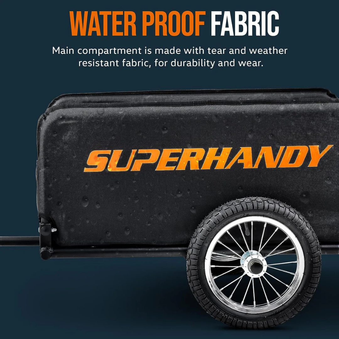 A close-up of a black SuperHandy Scooter Cargo Trailer with bold orange branding, featuring a large wheel and water droplets on its waterproof, tear- and weather-resistant fabric—built for seamless task integration.