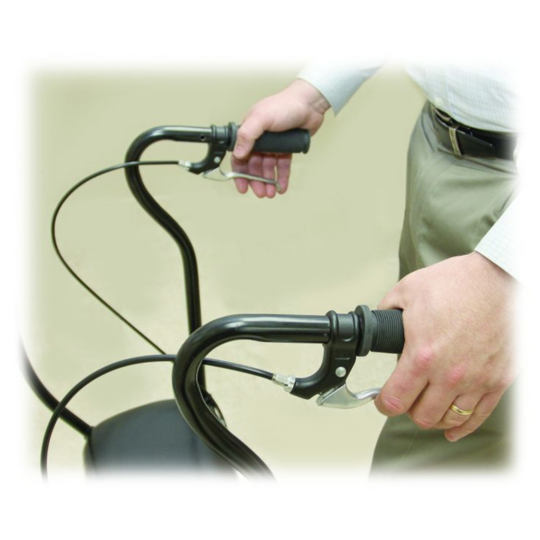 A person in a white shirt and khaki pants grips the U-Step Neuro Walking Stabilizer – Rolling Walker with Reverse Braking, their fingers on the handles, ideal for those with neurological conditions.