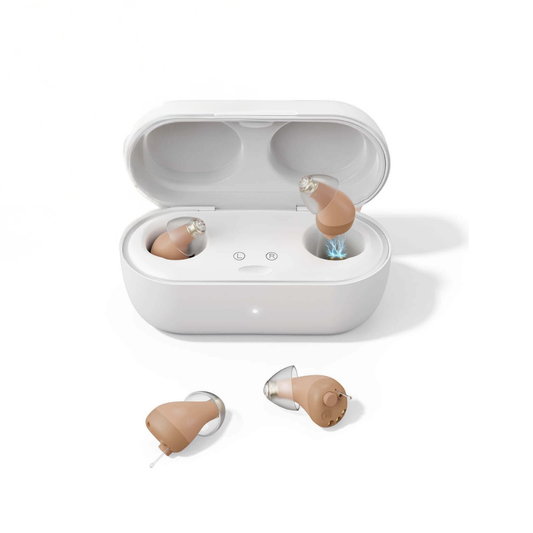 A white charging case holds two beige Vivtone SuperMini Hearing Aids, while two more next generation units are displayed outside the case on a white surface.