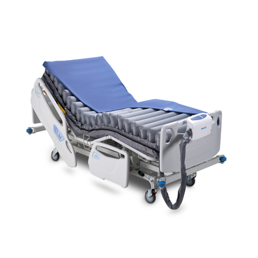 The Wellell Domus Auto G2 Bariatric Alternating Pressure and Low Air Loss System features a blue mattress with adjustable head section, side rails, control unit, and wheels—designed for comfort, pressure ulcer prevention, and easy mobility.