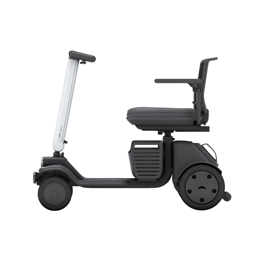 The Whill Model R 4 Wheel Portable Scooter, shown in profile with a black frame, supportive seat with armrests, and vertical handlebar, offers compact, modern design—ideal for effortless mobility and independence.
