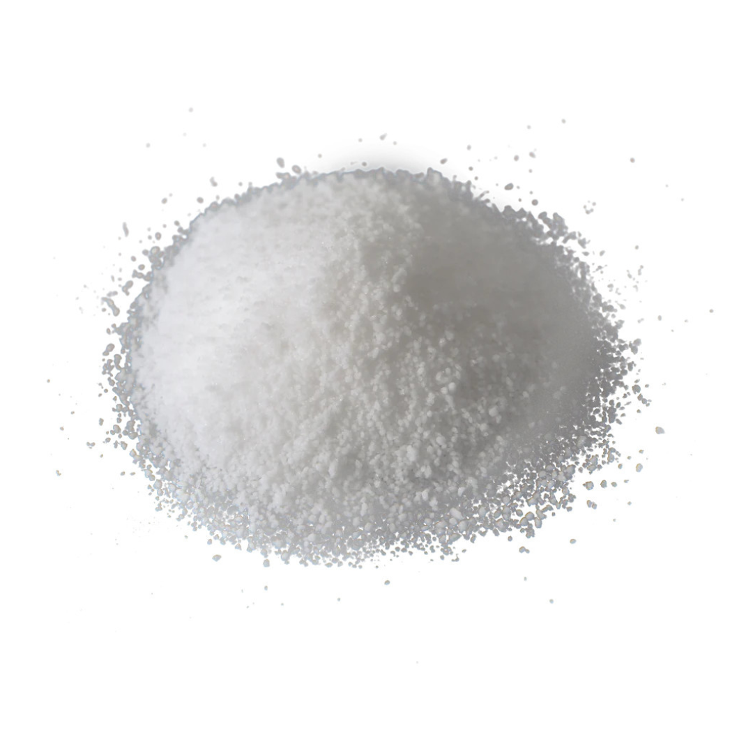 A mound of fine white powder, similar to salt or sugar, scattered on a white background—much like the Powder Coagulant 50 Count for Wrappon Orb Toilet used for sanitation support in portable toilets.