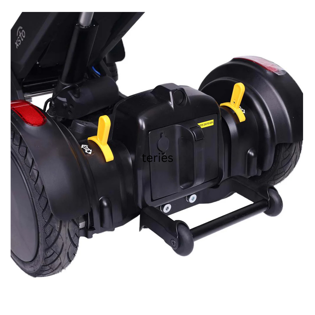 Close-up of the rear wheels and axle on an M4 Powerchair, showing two yellow levers and a black central casing with a charging port for XSTO Batteries for the M4 Powerchairs (24V wheelchair battery).